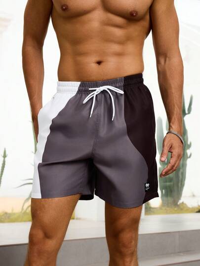Manfinity Swimmode شورت رجالي قصير بجيب ذو خصر سحاب، مناسب لموسم الصيف