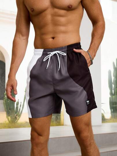 Manfinity Swimmode شورت رجالي قصير بجيب ذو خصر سحاب، مناسب لموسم الصيف