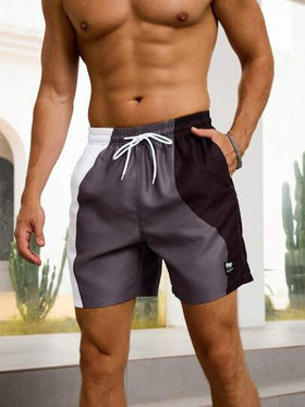 Manfinity Swimmode شورت رجالي قصير بجيب ذو خصر سحاب، مناسب لموسم الصيف
