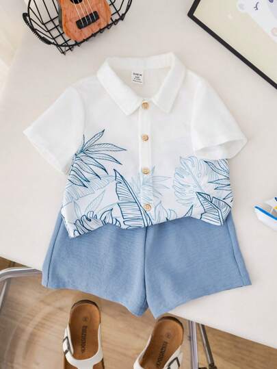 SHEIN مجموعة قميص أكمام قصيرة فضفاضة بنقشة أوراق بيضاء وشورت خصر مطاطي مناسبة للأولاد الرضع في الصيف للحفلات والمناسبات مثل عيد الميلاد وحفلات المساء والأعراس وحفلات استقبال المولود الجديد وعيد الميلاد الأول