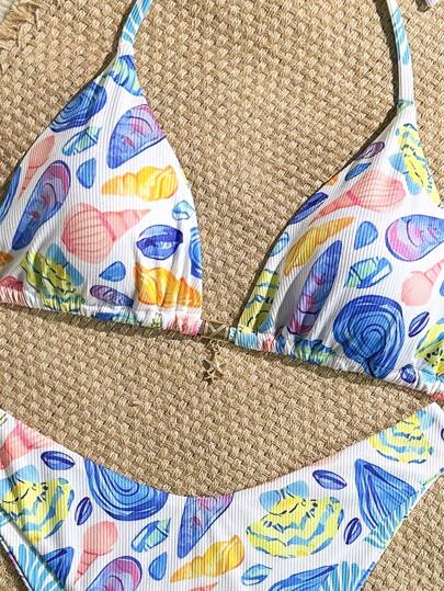 Swim Mod بيكيني مكون من قطعتين، طبعة عشوائية وقماش ذو ملمس مموج، إكسسوار على شكل نجمة بحر ذهبية، شريط خلفي مثلث للأعلى وسراويل سباحة قصيرة، طقم بيكيني جذاب