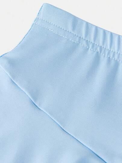 SHEIN تنورة رياضية صغيرة بلون أساسي للزي الكاجوال الشارعي للفتيات المراهقات