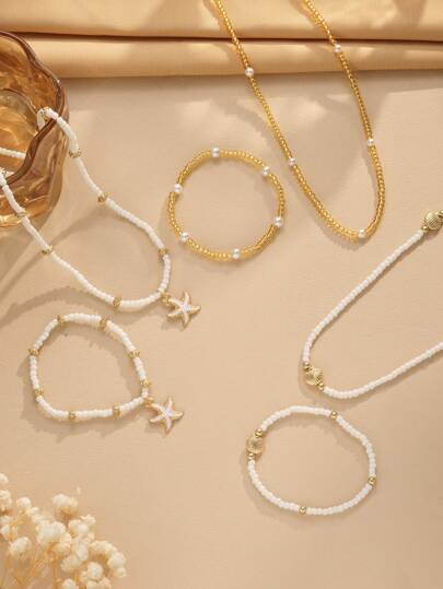 6/3 قطع مجموعة قلادة متعددة الطبقات وسوار من الحبال المطاطية، مزينة بالخرز وأشكال النجمة البحرية والصدف واللؤلؤ - قابلة للتعديل - مثالية لحفلات العطلات الشاطئية - مجوهرات وإكسسوارات صيفية للمرأة