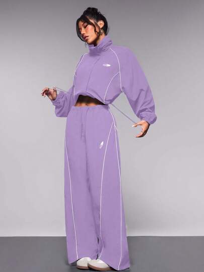 Streetz SHEIN Sport طقم رياضي للنساء يتكون من ملابس علوية ذات تصميم ألوان مركبة والبنطلون الرياضي، قطعتان