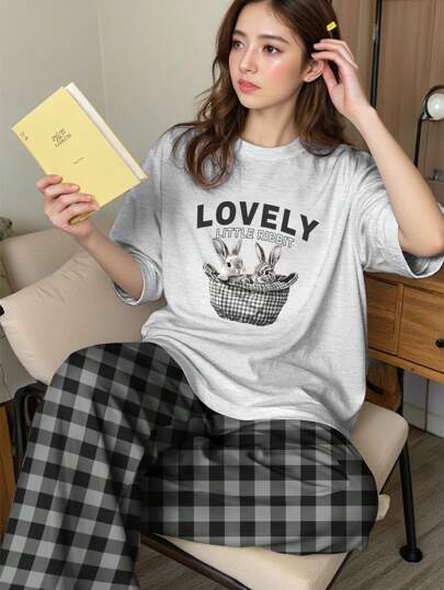 SHEIN طقم بجامة راسل مناسب للمراهقات بتصميم كاجوال فضفاض وبسيط، يشمل بلوزة برقبة دائرية وأكمام قصيرة وبنطال طويل، مناسب للربيع والصيف