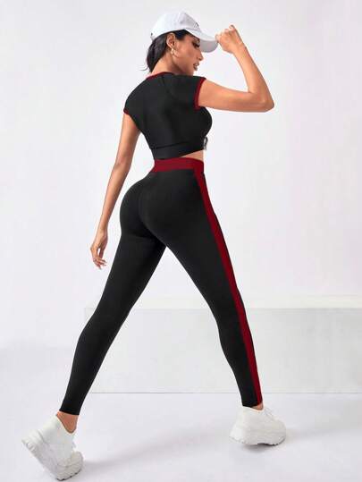 SHEIN Sport Studio طقم رياضي مكون من 2 قطعة، حاقن ظهر ملون بتصميم رقبة دائرية وأكمام قصيرة مع بنطلون طويل خصر عالي