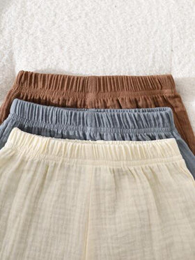 SHEIN Vintaside Kids طقم صيفي للأطفال الصبيان 6 قطع، ملابس علوية أكمام بلا أكمام بلون أحادي مطابق مع شورت، 3 طقوم باللون البني والمشمش والأزرق، فضفاض، مناسب للمنزل والأوقات الحرة والخروج والمناسبات
