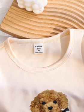 SHEIN Genkimix Kids طقم بيجامات فتاة من قطعتين يتكون من ملابس علوية كارتونية طويلة الأكمام مطبوعة بالفراشات والفيونكة، وبنطلون طويل