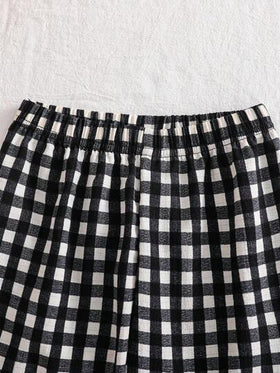 SHEIN Genkimix Kids طقم بيجامات فتاة من قطعتين يتكون من ملابس علوية كارتونية طويلة الأكمام مطبوعة بالفراشات والفيونكة، وبنطلون طويل