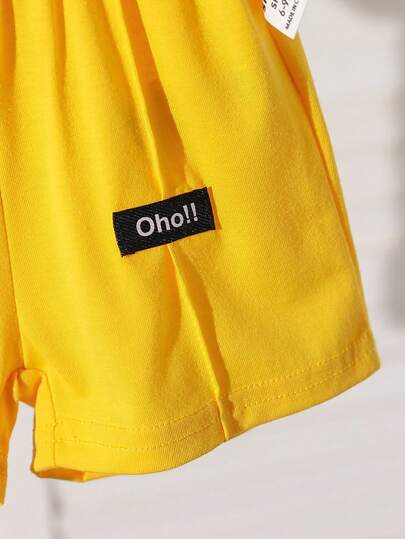 SHEIN Playful Pals طقم بنطلون قصير وتوب أزرق داكن للأطفال والأولاد الصغار، تصميم مزين بالكيب الأزرق، توب أكمام قصيرة أبيض مع شورت أزرق داكن، ملائم لارتداء اليومي في الصيف