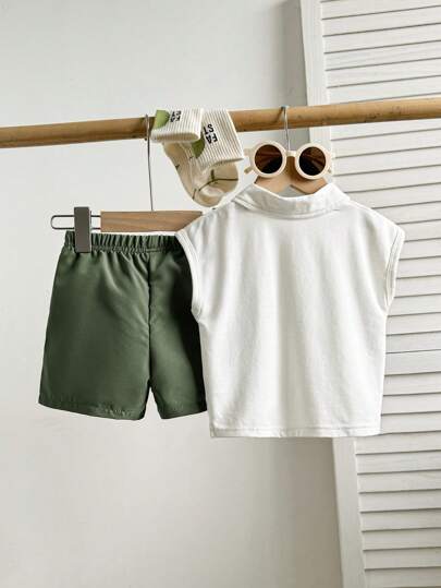 SHEIN Playful Pals مجموعة2 قطعة سترة أكمام بدون أكمام بياقة بولو وشورت للأطفال /الصبي، إطلالة أنيقة وجميلة للعب الصيف، للاستخدام اليومي والتنزه في المدينة