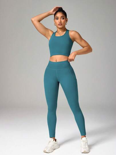 SHEIN Sport Studio طقم رياضي للنساء يتكون من ملابس علوية ذات ظهر متقاطع بلون واحد والسراويل الضيقة