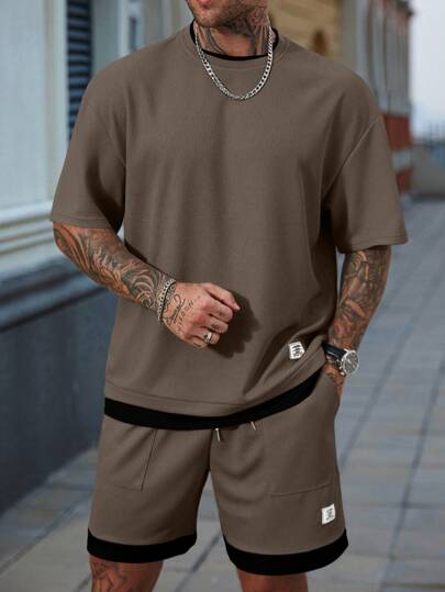 Manfinity CasualCool مجموعة قميص وشورت كاجوال للرجال، قميص بياقة دائرية وأكمام قصيرة مطبوع عليه رسومات حرفية، وشورت بخصر رباط، ملابس صيفية مريحة للشارع