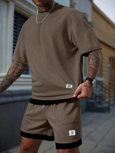Manfinity CasualCool مجموعة قميص وشورت كاجوال للرجال، قميص بياقة دائرية وأكمام قصيرة مطبوع عليه رسومات حرفية، وشورت بخصر رباط، ملابس صيفية مريحة للشارع