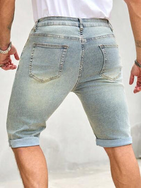 Manfinity Homme شورتات جينز كاجوال ضيقة بجيوب ممزقة ذات لون أحادي للرجال