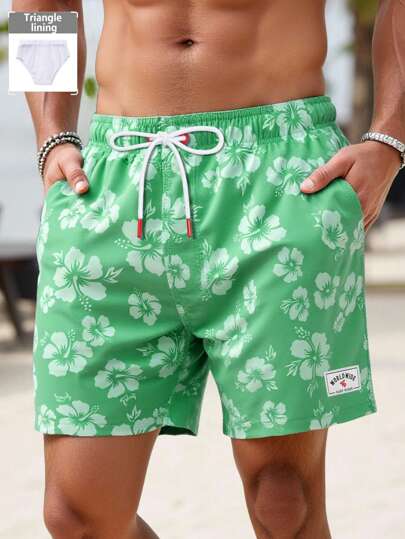 Manfinity Swimmode شورت شاطئ رجالي ذو جيب مطبوع بزهور ووسط رسن، مناسب للصيف