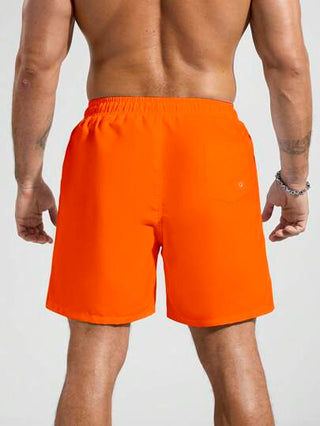 Manfinity Swimmode شورت شاطئ للرجال بخصر رباط بجيوب وألوان سادة مناسب للصيف، هاواي
