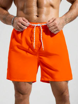 Manfinity Swimmode شورت شاطئ للرجال بخصر رباط بجيوب وألوان سادة مناسب للصيف، هاواي