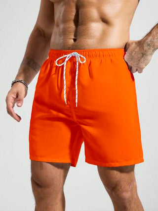 Manfinity Swimmode شورت شاطئ للرجال بخصر رباط بجيوب وألوان سادة مناسب للصيف، هاواي