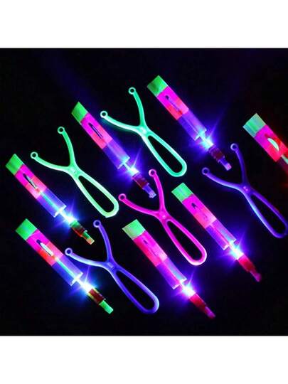 50 قطعة صاروخ سهم مضيء ومروحية طائرة بإضاءة LED هدية ممتعة لحفلات، مقذوف بحزام مطاطي، لوازم أجواء الحفلات