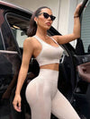 SHEIN Sport Studio بدلة رياضية للنساء تتكون من ملابس علوية بياقة طاقم بدون أكمام وبنطلون فضفاض بخصر مطاطي