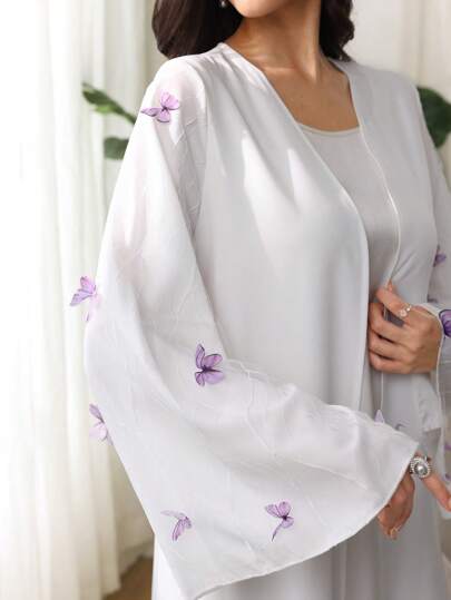 Al Najma كفتان إماراتي أنيق أبيض أكمام طويلة مزين بتطريزات بشكل فراشة للنساء