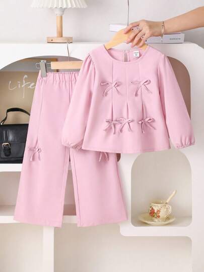 SHEIN Playful Pals مجموعة ملابس علوية مزينة بفيونكة جميلة وحلوة + بنطلون واسع الساق، بدلة بنات للربيع والخريف، بدلة بنات مكونة من قطعتين، بنطلون واسع، بدلة بنات للخريف والشتاء