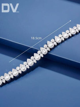 DV JEWELRY زوار واحد من أساور المرأة الفاخرة مطلي بالذهب الأبيض مزود بحجر الزركونيا المكعب، مجوهرات أنيقة للمواعدة والزفاف والحفلات وأعياد الذكرى هديةرمضان