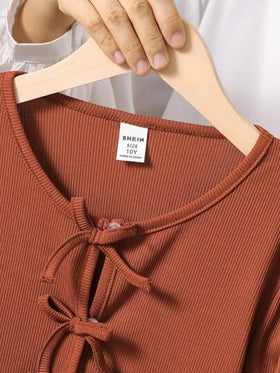 SHEIN Vintaside Kids مجموعة ملابس علوية بلا أكمام مطبوعة بزخرفة زهرية بسيطة وكارديجان علوي محبوك مع زخرفة فيونكة، للأطفال الصغار، للربيع/الخريف ، 2 قطعة