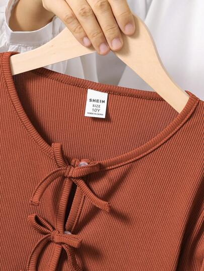 SHEIN Vintaside Kids مجموعة ملابس علوية بلا أكمام مطبوعة بزخرفة زهرية بسيطة وكارديجان علوي محبوك مع زخرفة فيونكة، للأطفال الصغار، للربيع/الخريف ، 2 قطعة