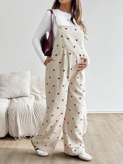 SHEIN جمبسوت سائبة بجيوب وبطبعة قلب مناسبة للحوامل