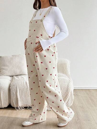 SHEIN جمبسوت سائبة بجيوب وبطبعة قلب مناسبة للحوامل