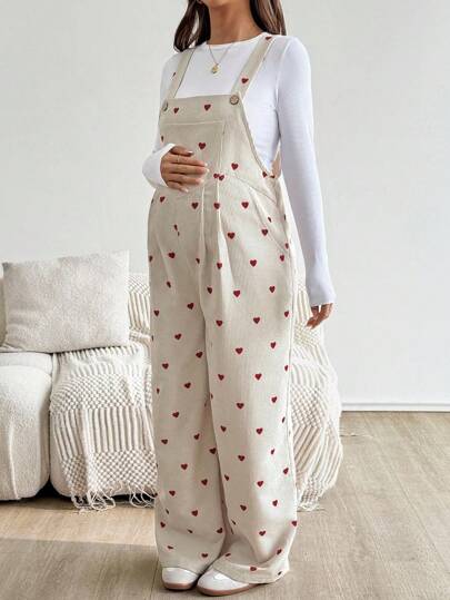 SHEIN جمبسوت سائبة بجيوب وبطبعة قلب مناسبة للحوامل