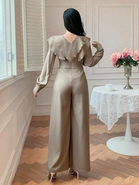 DAZY جمبسوت نسائية أنيقة بتصميم رقعي مع كشكشة على الحافة وأكمام طويلة، بلون أحادي