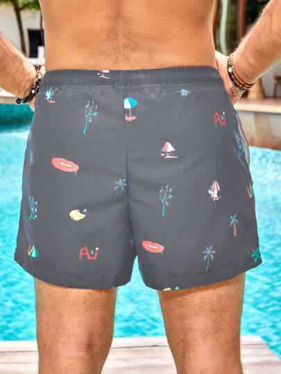 Manfinity Swimmode بنطلون قصير كاجوال للرجال بخصر ربطة وتصميم مطبوع مناسب للشاطئ