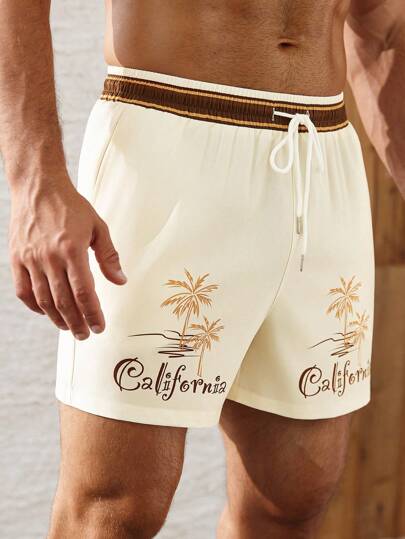 Manfinity Swimmode شورت شاطئ رجالي لفصل الصيف بخصر ربطة سحاب، مطبوع بأشجار جوز الهند والأحرف