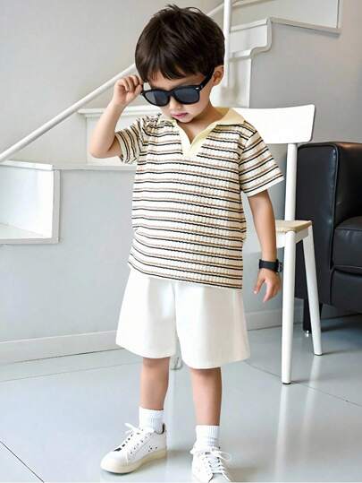 SHEIN Genkimix Kids قميص بولو ذو رقبة مخطط بنمط البلوزة الجامعية للفتيان، مناسب للفتية في عمر 4-7 سنوات للارتداء في الربيع والصيف، مناسب للارتداء في الخارج والمدرسة والمنزل، قطعة واحدة