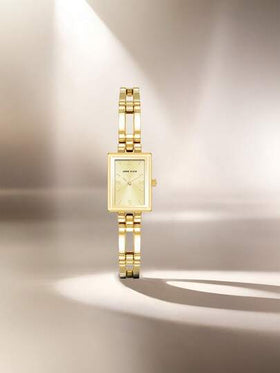Anne Klein ساعة كوارتز ذهبية اللون للنساء بسوار من الكوارتز مع قرص مربع بلون الشمبانيا الفاتح، ساعة فاخرة تناظرية مع سوار قابل للتعديل، ساعة هدية أنيقة للسيدات من واتش