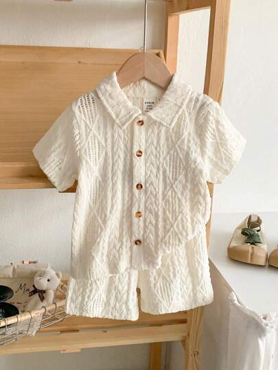 SHEIN Vintaside Kids ملابس أطفال حديثي الولادة إلى عام واحد، بلوزة أكمام قصيرة لون المشمش وطقم شورت، قماش ذو ملمس مناسب لارتداء الأطفال في الصيف، يضيف ملمسًا وجودة إلى الملابس