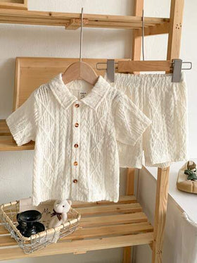SHEIN Vintaside Kids ملابس أطفال حديثي الولادة إلى عام واحد، بلوزة أكمام قصيرة لون المشمش وطقم شورت، قماش ذو ملمس مناسب لارتداء الأطفال في الصيف، يضيف ملمسًا وجودة إلى الملابس
