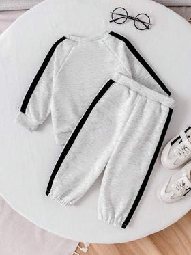 SHEIN مجموعة قطعتين لبدلة طفل صبي مريحة (قميص بأكمام قصيرة وشورت) ، طبعة ديناصور ثلاثية الأبعاد ، صالحة للربيع/الصيف، مقاس عمر 0-3 سنوات