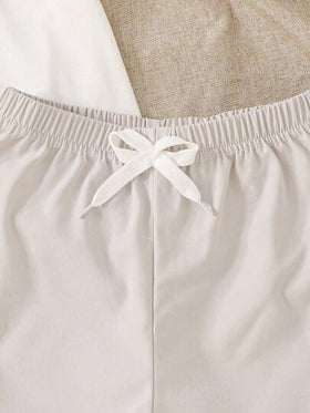 SHEIN Streecool Kids مجموعتان من قميص كاجوال بأكمام قصيرة وسروال صغير الحجم للأولاد ذو لونين متباينين وجيوب حمولة