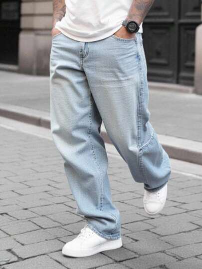 Manfinity Homme بنطلون جينز رجالي واسع مغسول فاتح - بتصميم مريح وكاجوال بساق واسعة وجيوب، تصميم طويل للأناقة الحديثة. بنطلون جينز رجالي كبير الحجم بلون أزرق فاتح