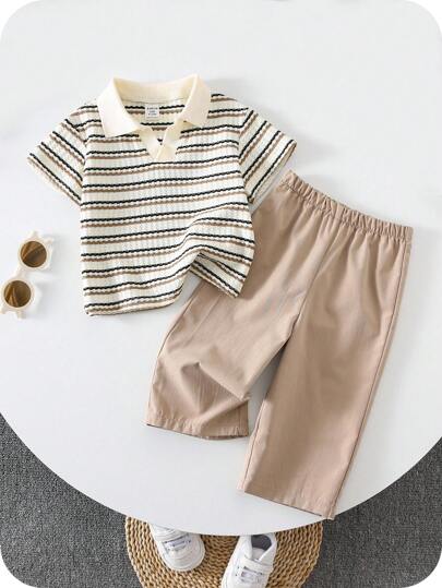 SHEIN مجموعة ملابس علوية قصير الأكمام مع أزرار وبنطال ذو خصر مطاطي، اللون مخطط لطفل/طفلة