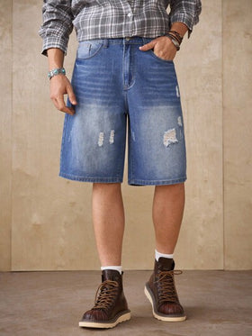 Manfinity Homme شورت جينز كاجوال فضفاض مبهت بتأثير مستهلك باللون الأزرق الفاتح