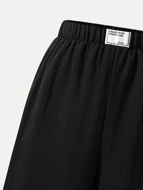 SHEIN Explorewe بنطلون فضفاض مرن الخصر من قماش منسوج للمراهقات، متعدد الاستخدامات للعودة إلى المدرسة، بنطلون أسود فضفاض وفضفاض للخريف والشتاء