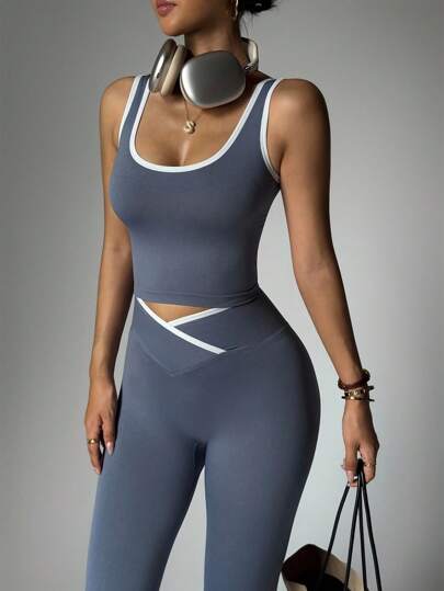 Easithlete مجموعة ملابس رياضية نسائية مكونة من قطعتين، تشمل تنورة وبلوزة بتصميم تداخل الخصر مع تفاصيل ملونة، مناسبة للتمارين الرياضية والتمارين اليوغا