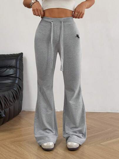 SHEIN EZwear بنطلون نسائي بأربطة مطرزة، تصميم عصري مناسب للصيف