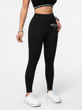 SHEIN Essnce سروال رياضي طويل مطبوع برسومات إيطالية ميلانو بتصميم بسيط وأنيق للسيدات