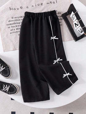 SHEIN Genkimix Kids بنطلون رياضي كاجوال مريح بفيونكة ربطة أسود ثابت، مناسب للصيف والخريف والشتاء